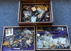 A large collection of costume jewellery, buttons etc.