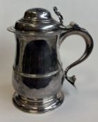 A George II silver lidded tankard of heavy gauge.
