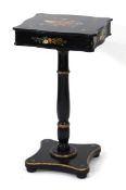 A late 19th century sewing table, the black painted body with floral decoration on a single column