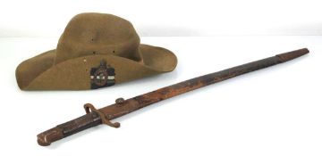 A Second World War Burma hat dated 1943 with a Broad Arrow stamp, worn by Corporal Roy Burns