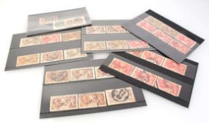 Thiirty-three KGV 'seahorse' stamps
