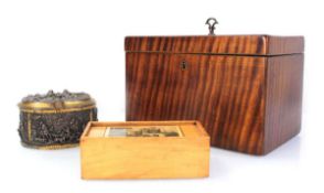 A 19th century fiddleback mahogany tea caddy of plain rectangular form, w. 20 cm, a French pressed