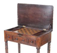A William IV rosewood games table, the surface lifting to reveal a removable chess board with
