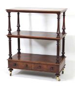 A Victorian mahogany three-tier what-not with two drawers, on turned legs and castors, 93 x 49 x 111