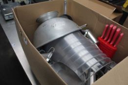 Box containing assorted plastic cake covers, metal ingredients scoops, sieve etc.