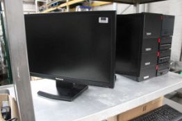 Four Lenovo Think Centre PCs with four screens, keyboards and associated IT peripherals