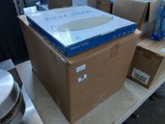Box containing 13x Cadac pizza stones