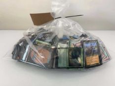 +VAT Bag containing a quantity of loose Magic the Gathering trading cards from various sets Where