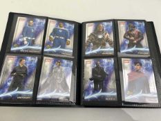 Binder containing Topps Chrome Marvel collectable cards Where possible these cards have been