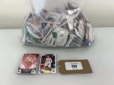 +VAT Bag containing football cards and stickers from various seasons Where possible these cards have