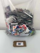 +VAT Bag containing loose football cards and stickers Where possible these cards have been