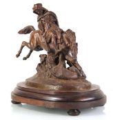A brown-patinated spelter figural group modelled as a tiger and huntsman on horseback, on a later