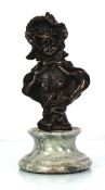 A bronze bust modelled as a girl wearing a bonnet, on a marble stepped plinth, unsigned, h. 20 cm