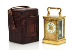A late 19th century French repeater carriage clock, the movement striking on a gong and numbered