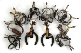 Nine pairs of spurs, various styles and materials (9)