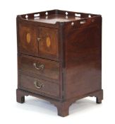 A George III mahogany pot cupboard or washstand with satinwood inlay and banding, the pair of