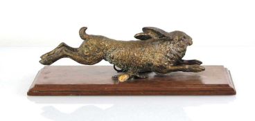 In the manner of Franz Bergmann, an Austrian bronze animalier desk clip modelled as a running