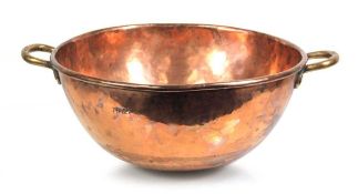 A large two-handled copper mixing bowl, di. 61 cm incl. handles