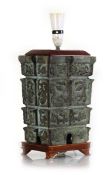 A 20th century Chinese bronze lamp base modelled in the archaic Shang Dynasty style, h. 31 cm,