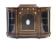 An Aesthetic Movement ebonised, burr yew, satinwood strung, marquetry and brass mounted sideboard
