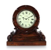 A Victorian mantle clock, the twin fusee movement striking on a bell, the painted 7.5 inch dial with