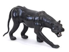 A large leather figure modelled as a panther, in the manner of Dimitri Omersa for Liberty & Co.,