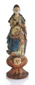 A polychrome wooden 'Santos' figure, h. 32 cm