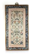 A 20th century Chinese silk panel embroidered with floral sprays, vases of flowers and characters,
