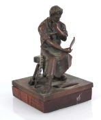 After Von Füllborn, a brown-patinated figure modelled as a seated engineer, signed, no foundry mark,