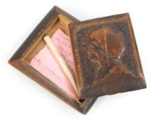A First World War carved Prisoner of War cigarette box and cigarette *Given to Sapper G.H. Burns R.