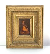 A 19th century walnut, satinwood and rosewood marquetry panel depicting a mother and child,