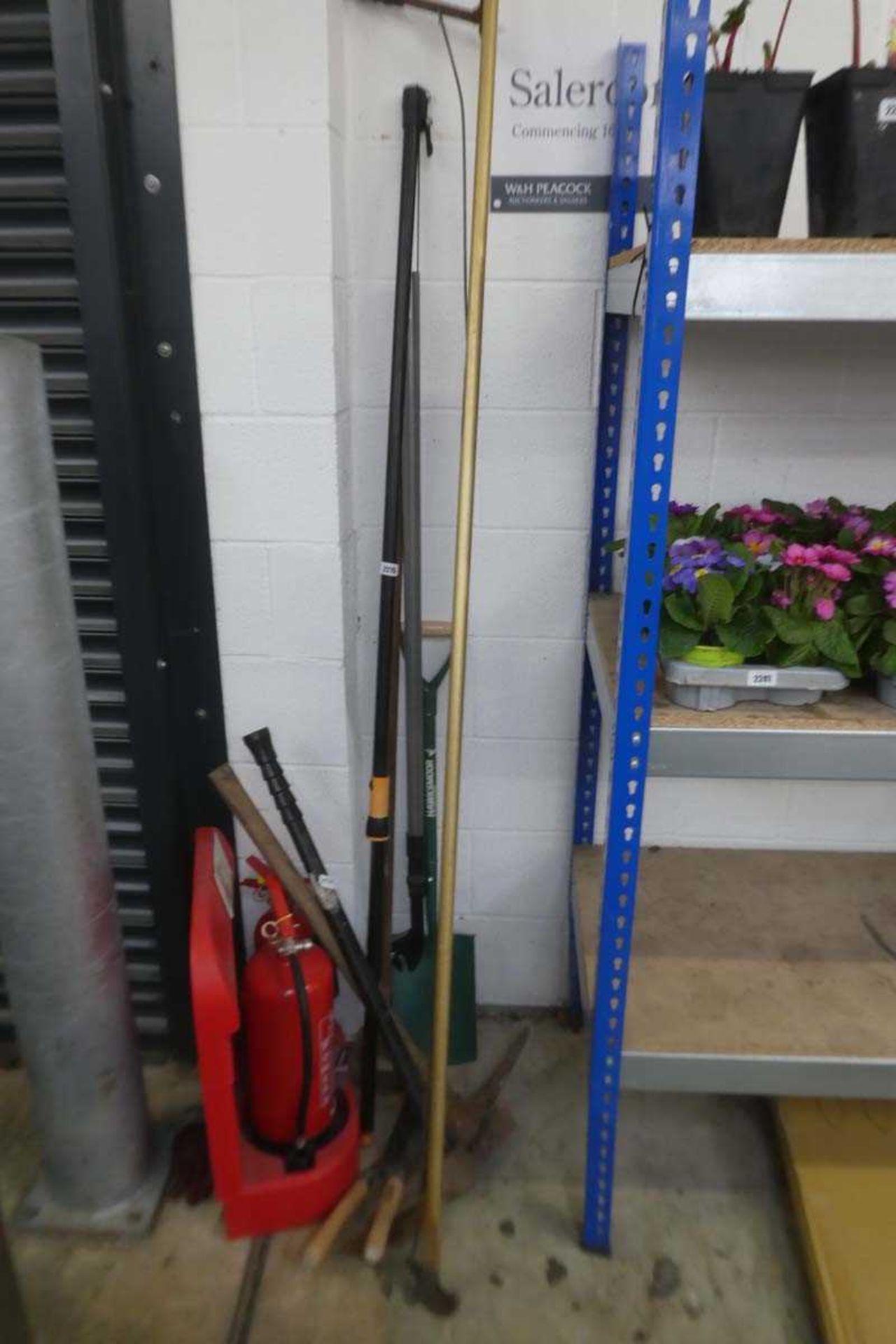 Small quantity of hand tools incl. pickaxes, tree loppers, shovels, etc.