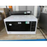 Toshiba microwave oven in black and white