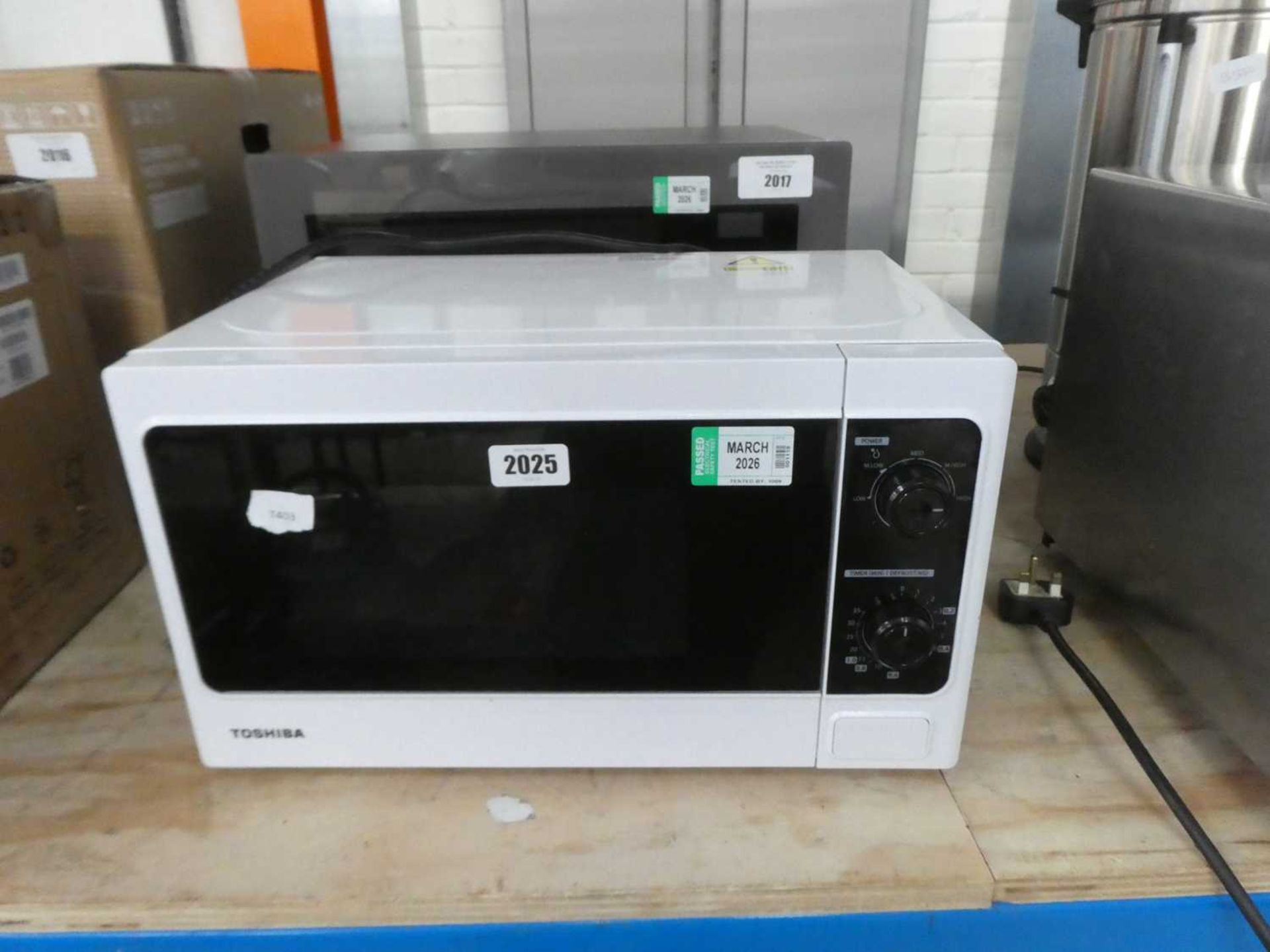 Toshiba microwave oven in black and white