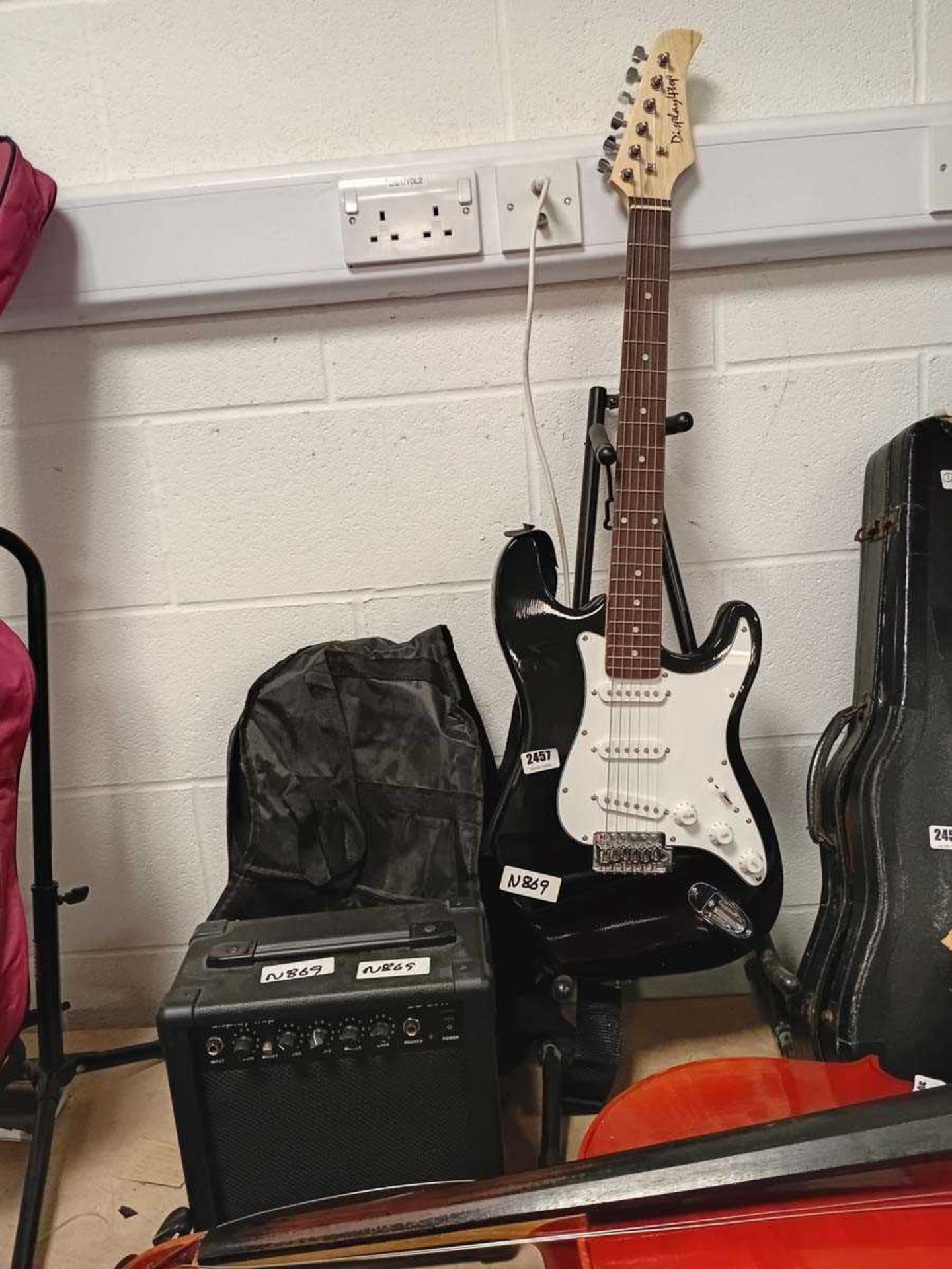 Display 4 Top electric 6 string guitar with a case
