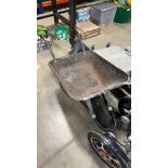 Black metal wheelbarrow