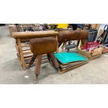 Quantity of vintage gymnastics equipment including springboards, brown leather bench vaulting