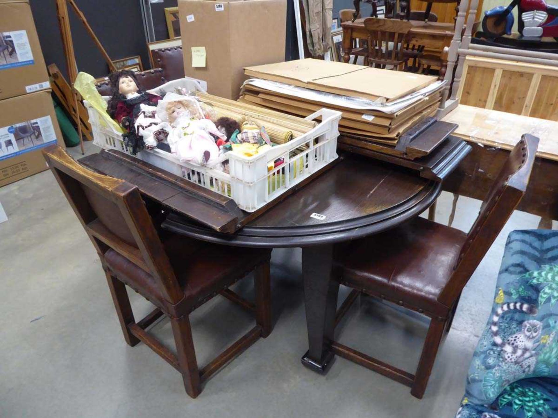 Oak extending dining table plus 5 chairs to include a single carver