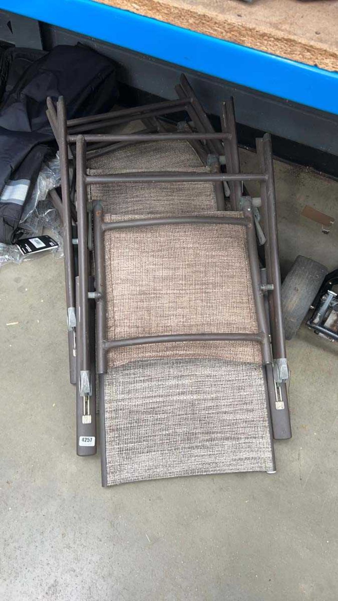 Four folding outdoor garden chairs