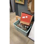 Box containing ceiling lights with glass shades, three boxes of Ikea furniture parts and some