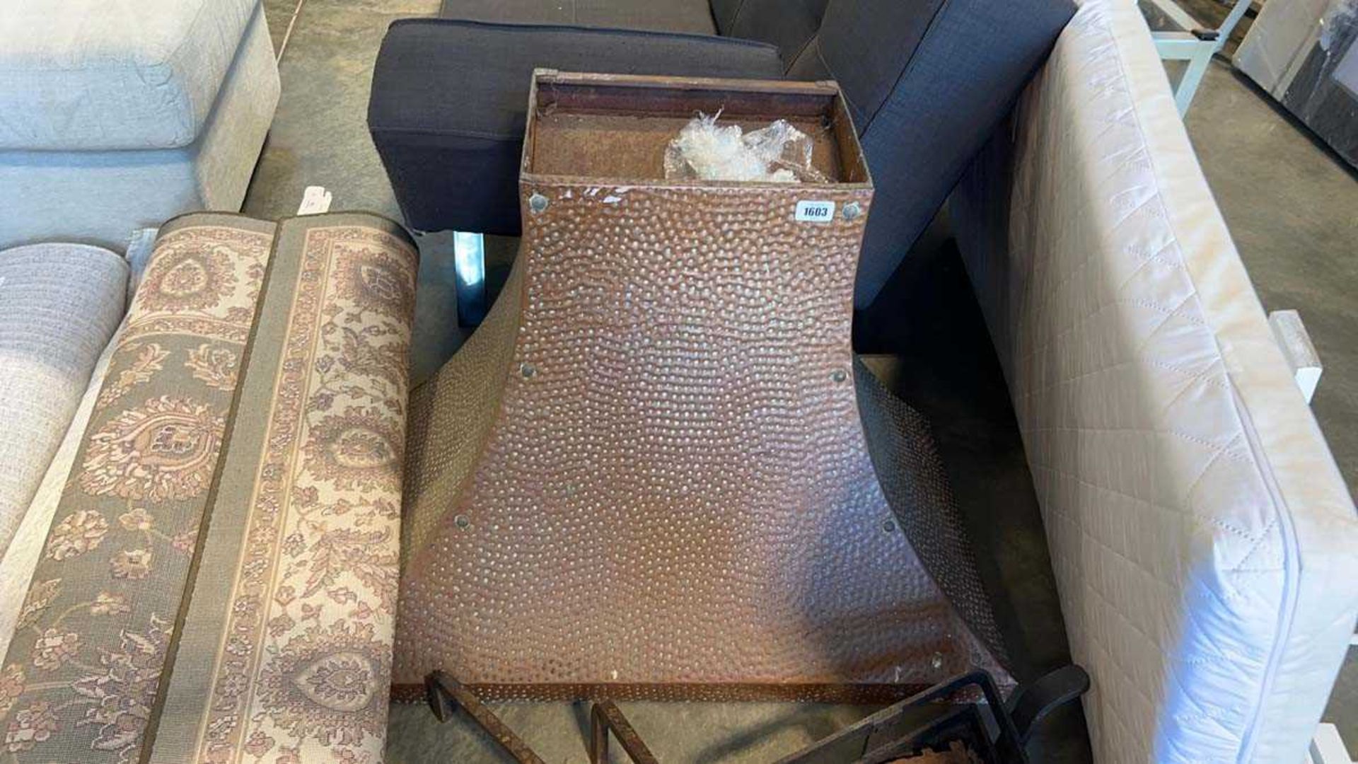 Beaten copper chimney hood