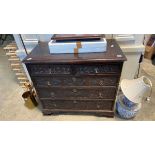18th century dark oak chest of 2 over 3 drawers with decoratively carved drawer fronts