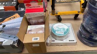 Box of Clippasafe 2 piece magnetic lock kits together with a roll of Butyl tape