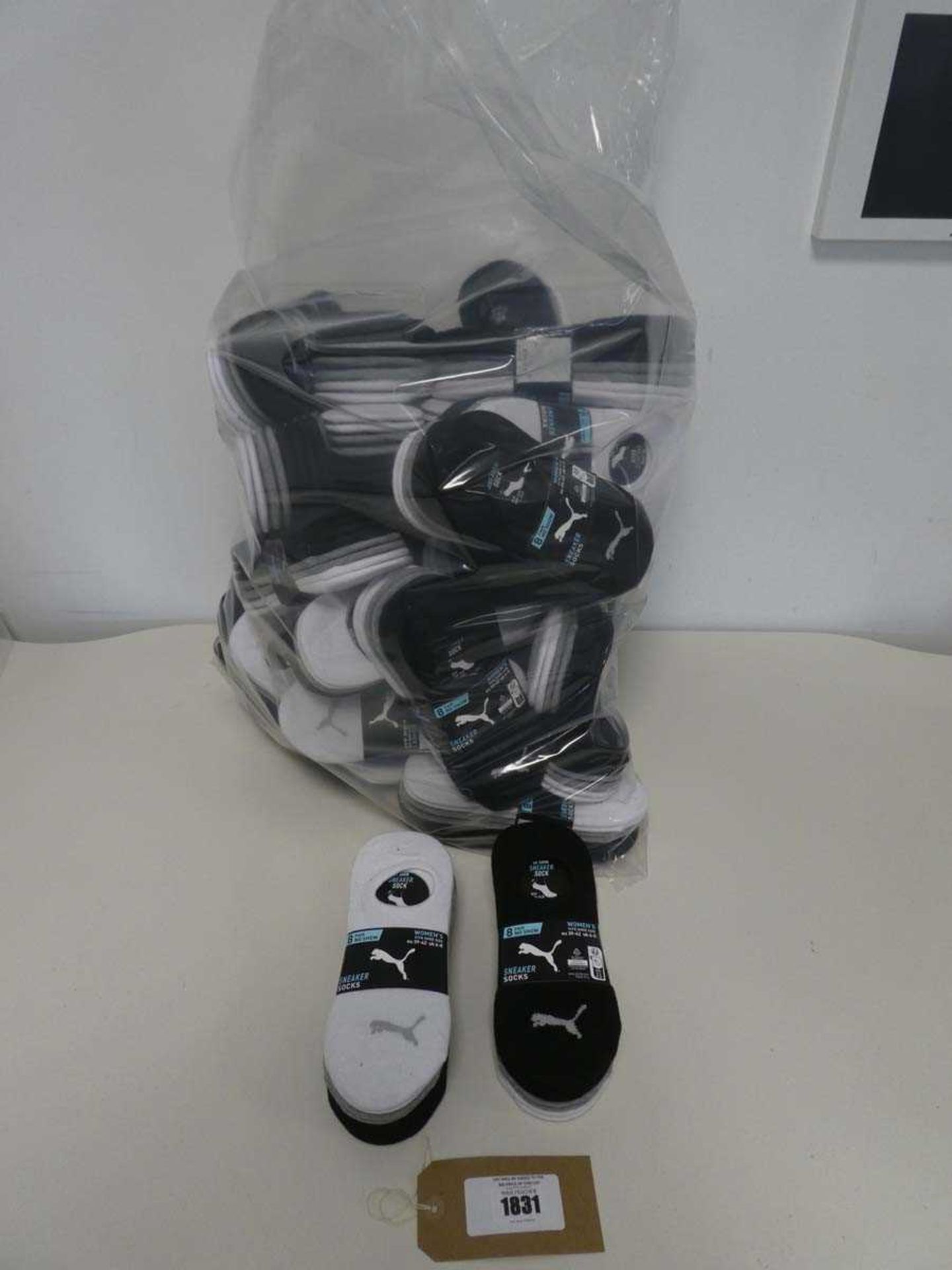 +VAT Approx. 32 packs of ladies no show sneaker socks by Puma.