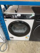 +VAT Haier 9kg heat pump dryer in white and black