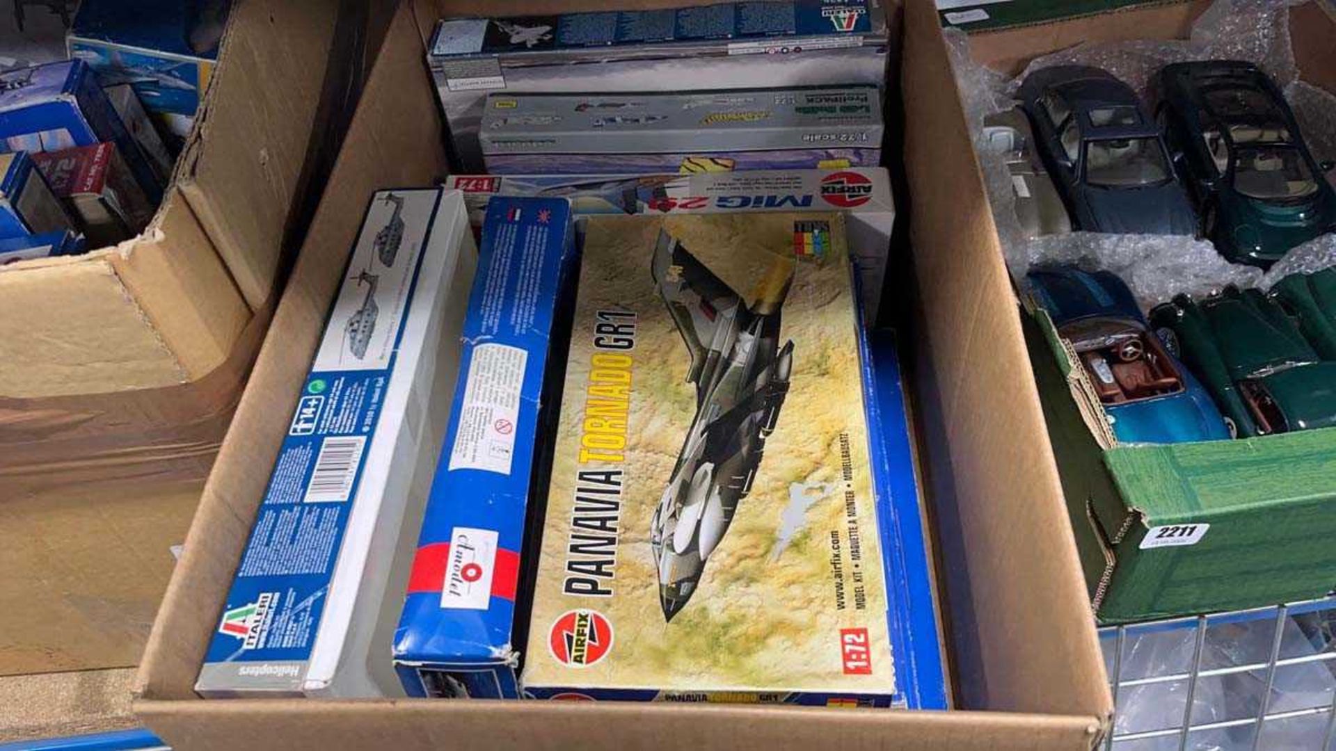 Model Kit Boxes 4 boxes containing various model kits