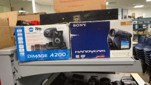 Boxed Sony DCR DVD handicam and Minolta DiMage a200 camera