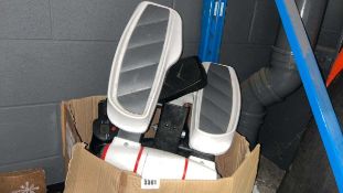 Box of various elliptical leg trainers