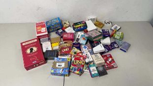 +VAT Packs of cards and games to include Uno, Kanoodle, Encrypted etc