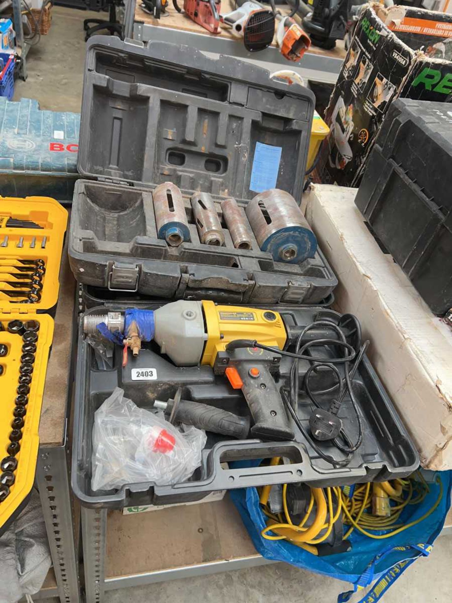 Part cased diamond drilling kit, together with a cased Diamond Core RT-110 drill